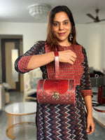 Load image into Gallery viewer, PURE LEATHER BAG WITH MASHRU SILK AJRAKH FABRIC
